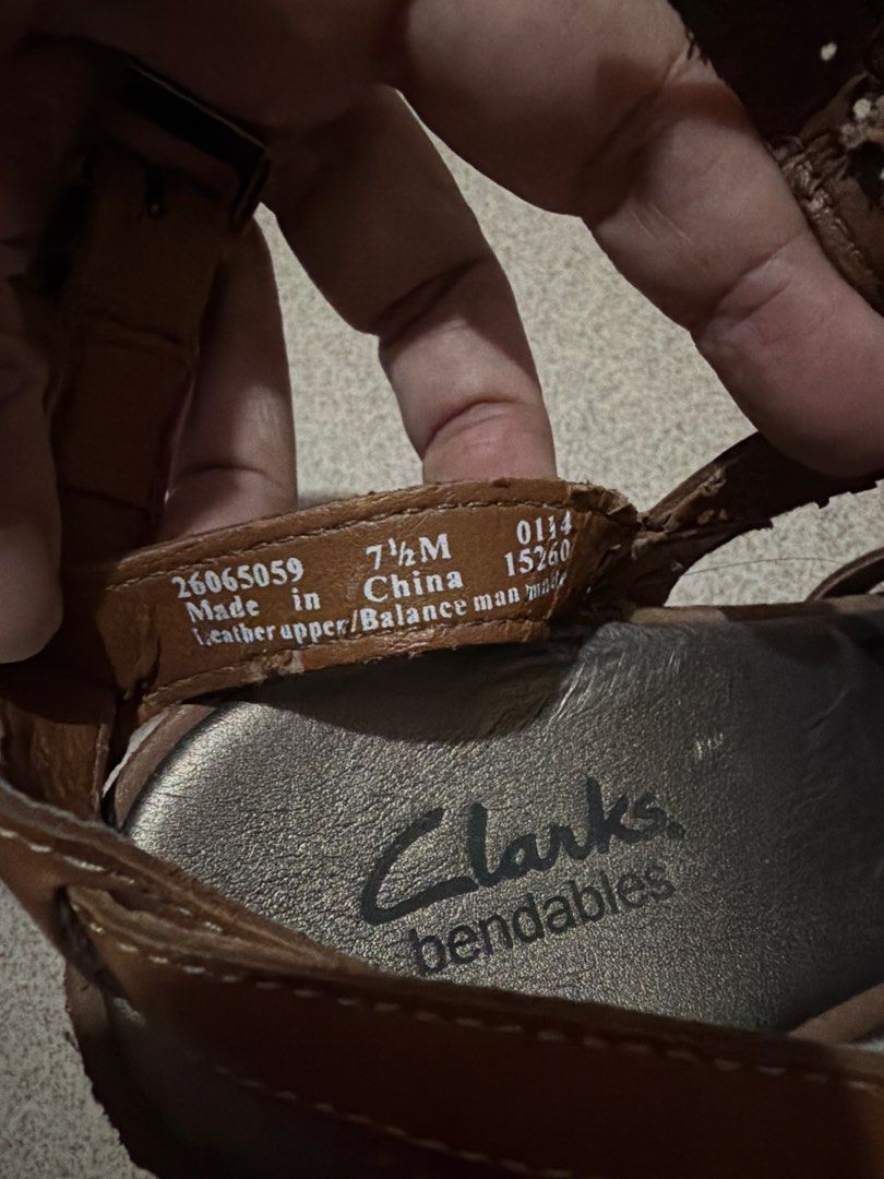 Clarks Bendables Brown Leather Wedge Sandals Size 7.5 (Category: Flats & Sandals) located in Las Pinas. Submitted by ces0427 (Listing ID 1463553468, Image 3). Description: - Brand: Clarks Bendables - Material: Genuine Leather Upper - Color: Brown - Style: Wedge Sandals - Features: Strappy design, Ankle buckle closure - Comfort: Designed for everyday wear - actual picture with minir flaw but overall excelleny vondition.