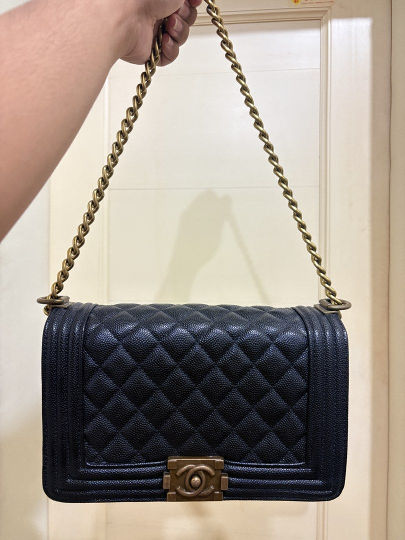 Elegant quilted medium shoulder black bag (Category: Shoulder Bags) located in Caloocan City. Submitted by theartmonster (Listing ID 1463417174, Image 1). Description: . Has faded gold chains . Rarely used(stuck in my closet) .Slightly negotiate (plus shipping fee).