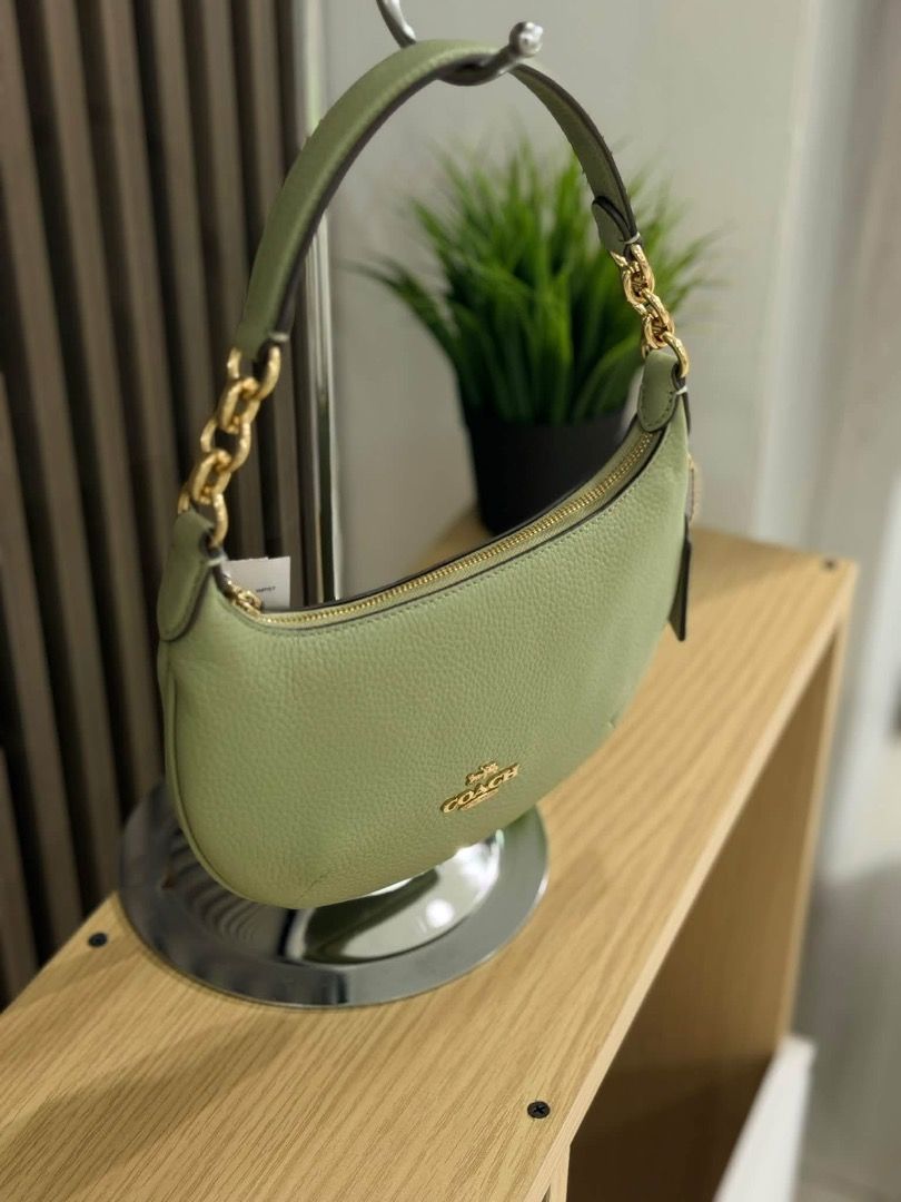 Coach Mini Payton Pistachio (Category: Luxury Bags & Wallets) located in Manila. Submitted by happytiger7 (Listing ID 1463421917, Image 2). Description: Coach Mini Payton Pistachio • Length: 8.5 in (21.6 cm) • Height: 6.0 in (15.2 cm) • Width: 1.25 in (3.2 cm) Brand new Complete with tag, care card, polypouch Lalamove-ready .