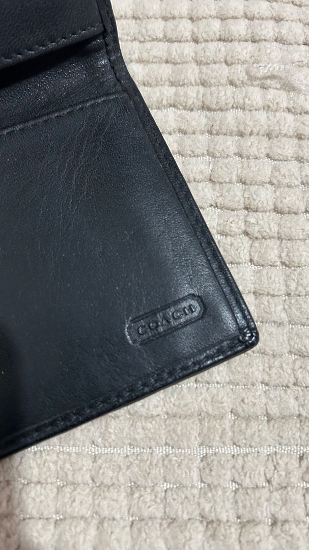 Coach Signature C Monogram Bifold Wallet Black (Category: Luxury Bags & Wallets) located in Caloocan City. Submitted by belaciao_ (Listing ID 1463420316, Image 3). Description: - Classic Coach wallet - Black signature C monogram canvas - Leather interior with card slots and bill compartment - Secure snap closure - Dimensions: Approx. 7" x 3.5" (closed) - Ideal for everyday use.