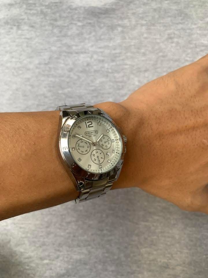 Coach Silver Dial Butterfly Lock (Category: Men's Watches) located in Manila. Submitted by jaivrgr22 (Listing ID 1463403889, Image 2). Description: Excellent Condition All Working / No issue With Hard Box & Paper Bag .