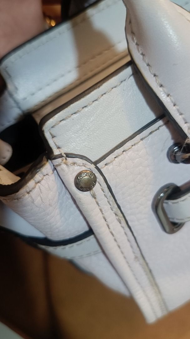Coach Swagger 20 Pebble Leather Light Blue Handbag (Category: Luxury Bags & Wallets) located in Subic. Submitted by lyziez_thrift (Listing ID 1463549458, Image 3). Description: - Light blue Coach Swagger 20 bag - Genuine pebble leather - Top handles - Detachable chain strap - Black metal hardware - Minor scuffs on bottom edge - Clean interior - Ideal for everyday use.