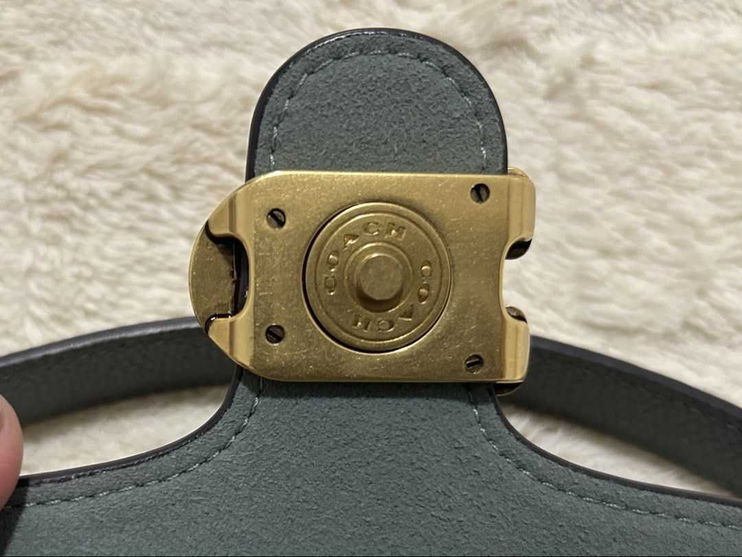 Coach Tabby Bag Genuine Pebbled Leather (Category: Luxury Bags & Wallets) located in Malabon City. Submitted by jenjerenjen13 (Listing ID 1463433097, Image 3). Description: - Authentic Coach Tabby Bag - color sage green - Genuine Pebbled Leather - Iconic Gold C Hardware - preloved - original - size 20 (mini) - with tag , coach dustbag , can provide receipt - with long strap - 9/10 condition.