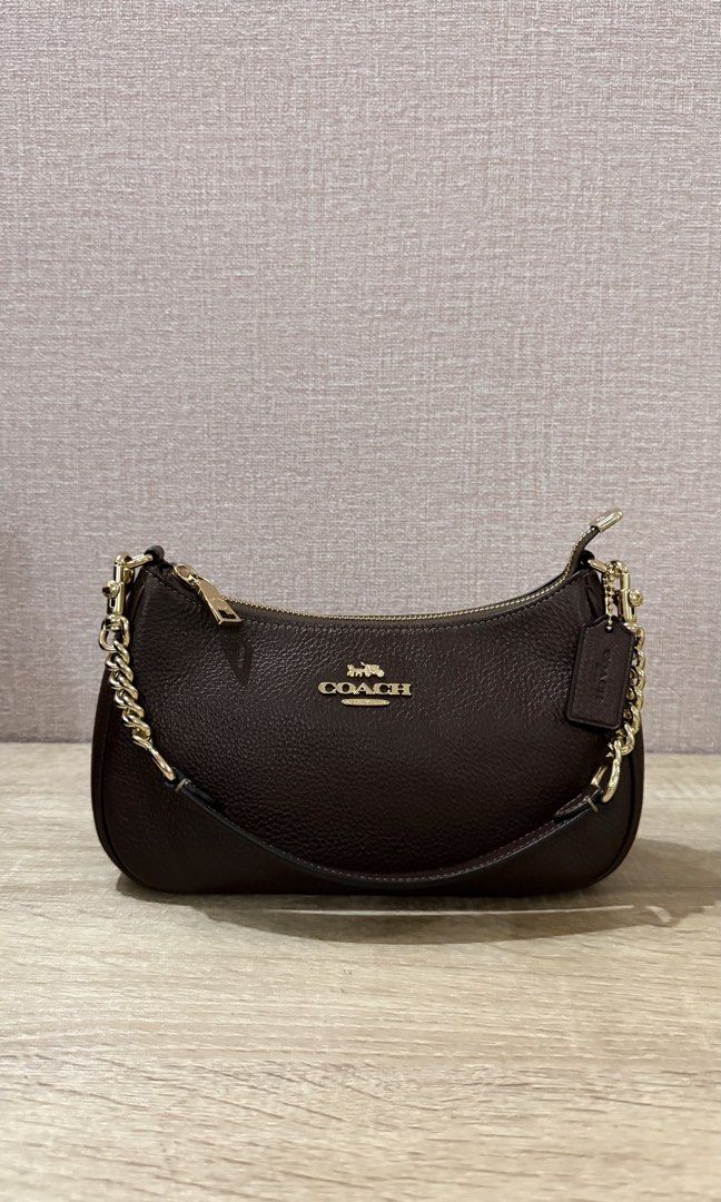 LP! Coach Teri Shoulder Bag in Maple (Category: Luxury Bags & Wallets) located in Calauan. Submitted by ciedeclutters (Listing ID 1463431893, Image 2). Description: LAST PRICE❕ PRELOVED but like new Rfs: decluttering, iba na naman ang gusto 🥹 10000% OG obvious naman sa details Made in Philippines (with tag & cc).