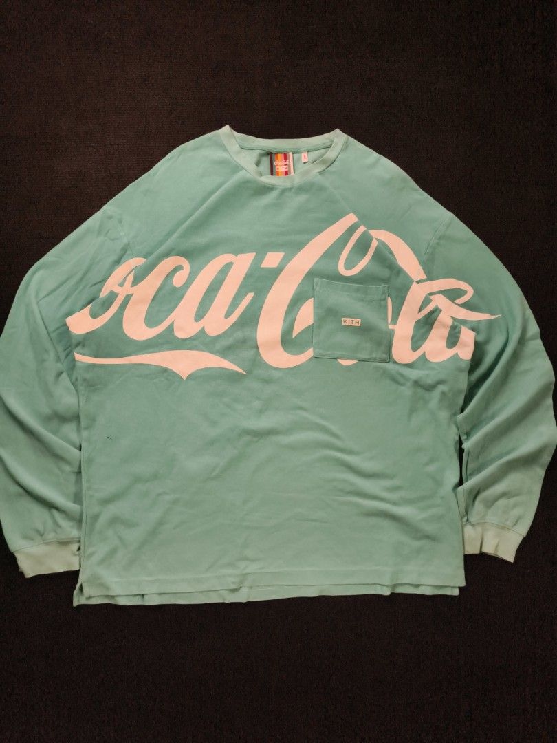 Coca Cola x KITH (Category: Coats, Jackets and Outerwear) located in San Fernando. Submitted by gaboo_asncn (Listing ID 1463547960, Image 2). Description: - Coca Cola x KITH - Size: XL on tag (W26/L32) - Condition: Excellent - Color Rate: 9/10 - No issue / "need wash".
