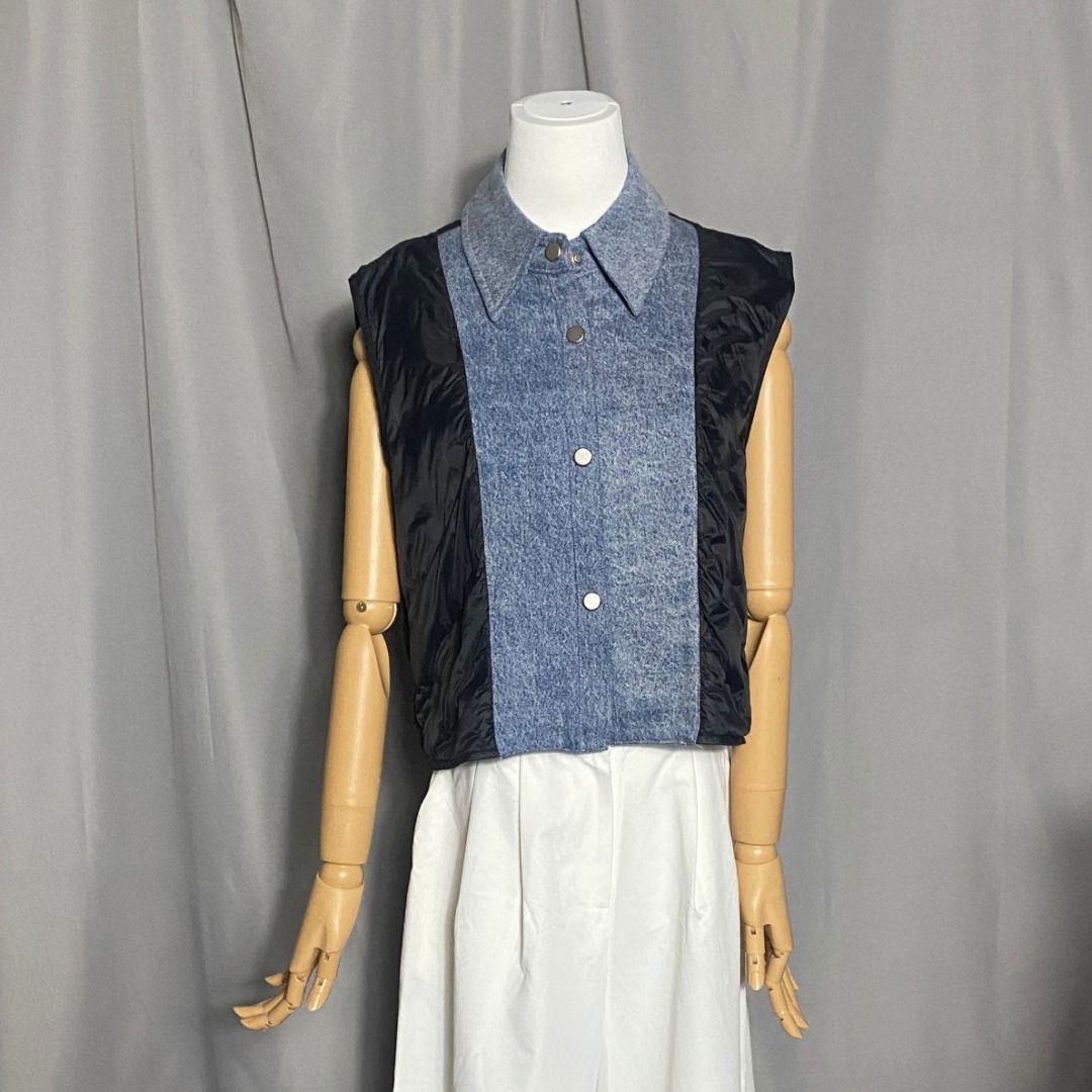 Collared mixed-media denim vest featuring a blue denim front panel and black contrast side inserts (Category: Sleeveless) located in Las Pinas. Submitted by ipickyou (Listing ID 1463477451, Image 1). Description: Unwashed 𝗠𝗲𝗮𝘀𝘂𝗿𝗲𝗺𝗲𝗻𝘁𝘀 𝘄𝗵𝗲𝗻 𝗹𝗮𝗶𝗱 𝗳𝗹𝗮𝘁: -Armpit to armpit: 20 1/2” -Length: 19” .