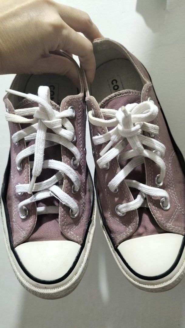 Converse All Star Chuck Taylor Low Top Sneakers (Category: Sneakers) located in Angeles City. Submitted by morikori (Listing ID 1463405403, Image 1). Description: - Classic Converse Chuck Taylor low tops - Dusty rose/mauve color - Canvas material - White laces and soles - Minor signs of wear on soles and fabric - Plenty of life left for casual wear.
