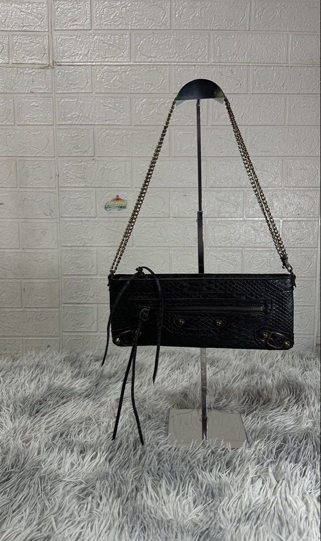 Cr*codile leather 2-way shoulder bag (Category: Clutches) located in Manila. Submitted by paulovenegaskalakal2020 (Listing ID 1463462027, Image 1). Description: For sale! Kalakal Crocod*le Leather 2-way shoulder bag B*lenciaga city inspired WOMENS Small 11.5 width x 5 length inches Good as new MINE 1,350 +sf.