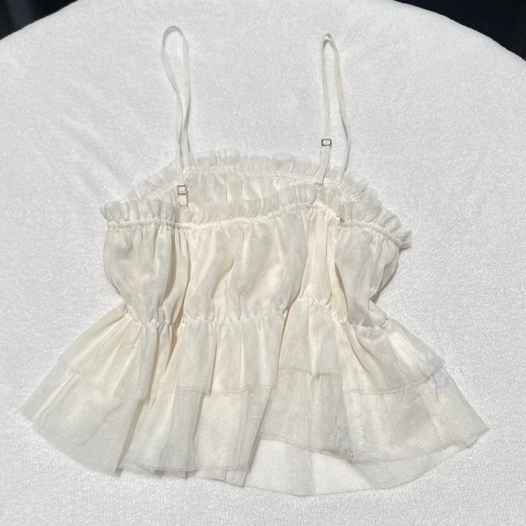 Cream Chiffon Top (Category: Others Tops) located in Paranaque City. Submitted by k_baefits (Listing ID 1463383604, Image 2). Description: -xs to small -stretchable.