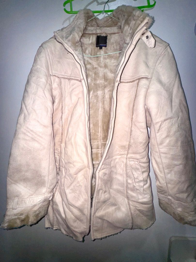 Cream Faux Fur Lined Suede Jacket (Category: Coats, Jackets and Outerwear) located in Las Pinas. Submitted by stroberriii (Listing ID 1463398022, Image 2). Description: - Cream colored jacket - Soft faux fur lining and trim on cuffs and hem - Zip-up front with a collar - Two side pockets - Warm and cozy for cooler weather - Great for casual wear.
