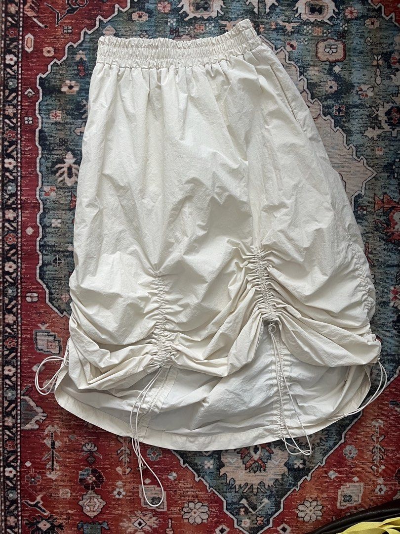 Cream Ruched Drawstring Midi Skirt (Category: Skirts) located in Quezon City. Submitted by lynchburg (Listing ID 1463354969, Image 2). Description: - Cream midi skirt - Ruched drawstring detail at hem for adjustable silhouette - Comfortable elastic waistband - Lightweight material - Ideal for casual wear.