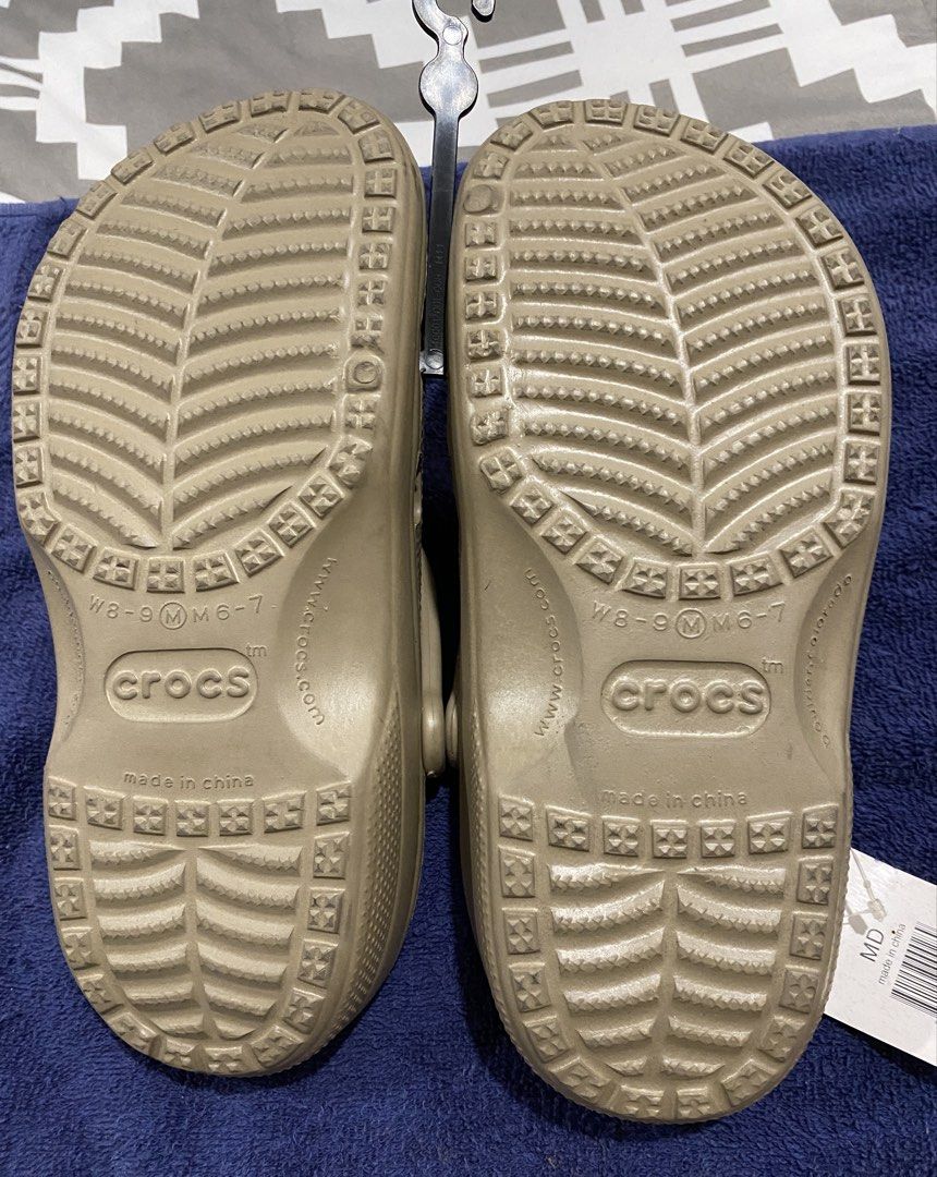 Crocs Beach Clogs Khaki Size MD (Category: Slippers & Slides) located in Muntinlupa City. Submitted by mj.finds (Listing ID 1463434741, Image 2). Description: - Khaki Crocs clogs - Beach style - Size: MD - Made in China - Original tags attached - Never worn.