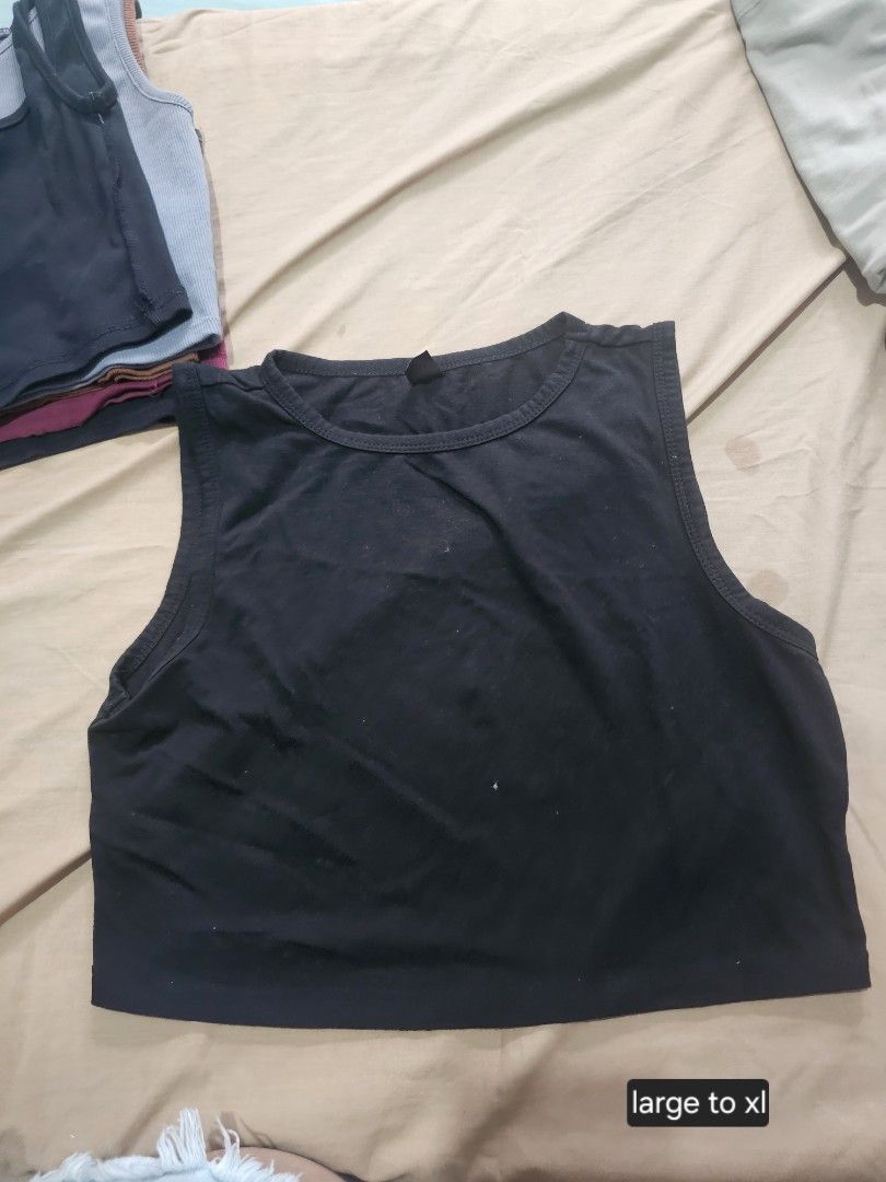 Crop tops (Category: Sleeveless) located in Manila. Submitted by nicolealison (Listing ID 1463341071, Image 2). Description: random tops for P50 each. take all for P500 all bought from orange app. size: med to semi large unless stated in the photo to order pls msg me which one to get. thanks! rfs: too many crop tops..