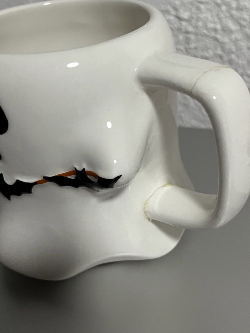 Cute Ghost Mug with Bats Design (Category: Vases & Decorative Bowls) located in Mandaue City. Submitted by allthingzdopamine (Listing ID 1463372700, Image 3). Description: Cute Ghost Mug with Bat Design 👻🦇 -Ideal for display or decorative purposes only. -Has light crazing, as shown in the photos. -Handle broke during shipping. -Has a small chip. -Please see all photos for the condition and details. ***Selling as-is..