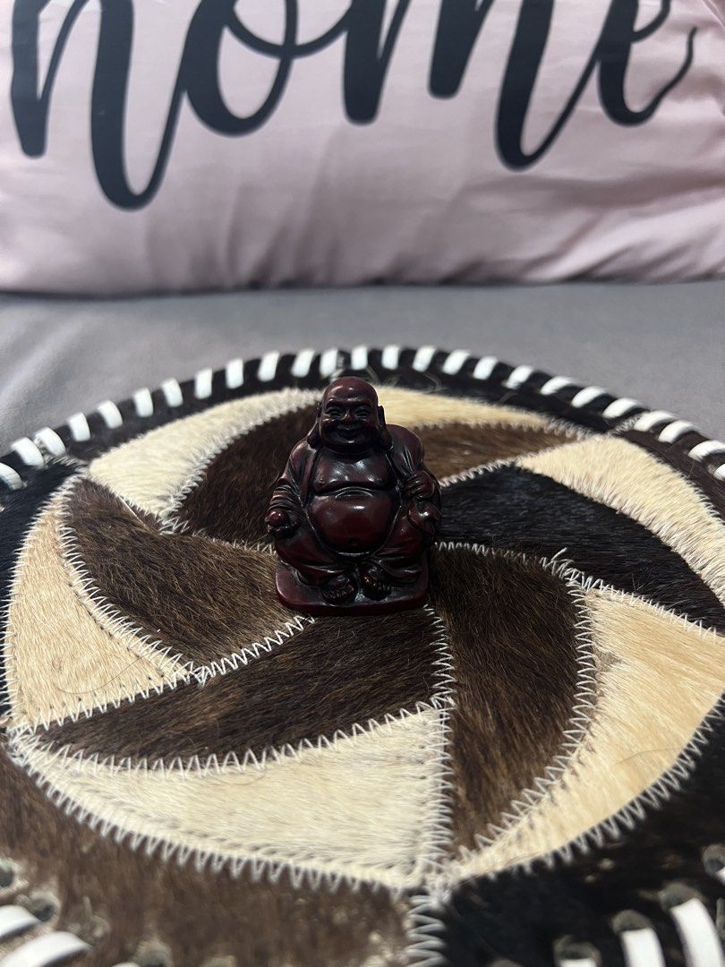 Cute Laughing Buddha Figurine - Dark Red (Category: Other Home Decor) located in Las Pinas. Submitted by maple0305 (Listing ID 1463347094, Image 1). Description: - Small, dark red laughing Buddha figurine - Sitting with a big smile - Approximately 2 inches tall - Ideal for desks or shelves - Adds charm and character to any space - Perfect as a gift or personal keepsake.