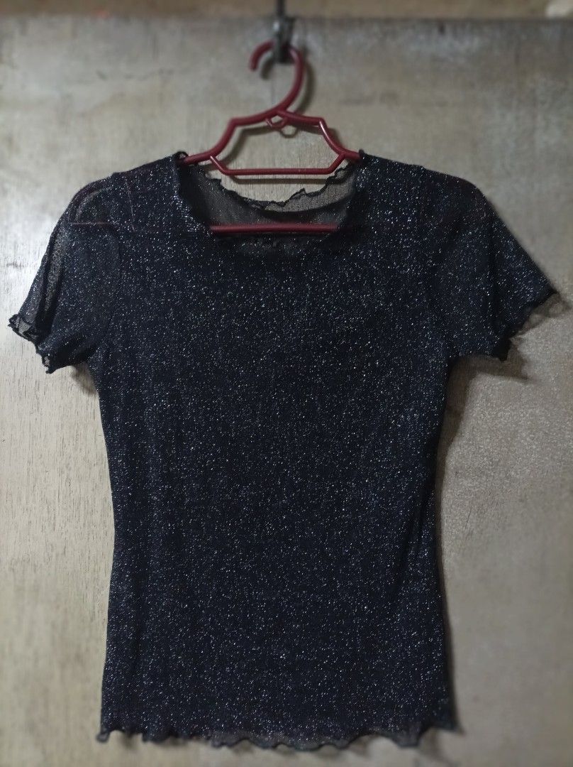 BLACK MESH TOP (Category: Shirts) located in Makati City. Submitted by jessu_ (Listing ID 1463384081, Image 1). Description: Sheer black mesh top with silver glitter. Short sleeves, lettuce hem. Stretchy. Perfect for casual look. Small to medium 2nd photo for closer look Buy 3 + 1 free of your choice from any available listing RFS: Decluttering MOP: GCash or bank transfer.