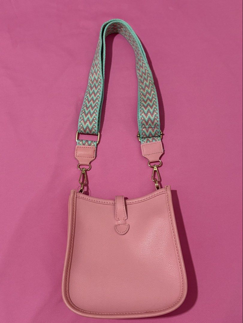 Cute Pink Crossbody Bag with Chevron Strap (Category: Cross-body Bags) located in Quezon City. Submitted by luna_ily (Listing ID 1463513078, Image 2). Description: 🍒 Be reminded that this is preloved and may not be in its best condition as before. It has minimal stains but the zipper and the strap are still working properly. 🍒 Don’t hesitate to send a message for further details and inquiries. .