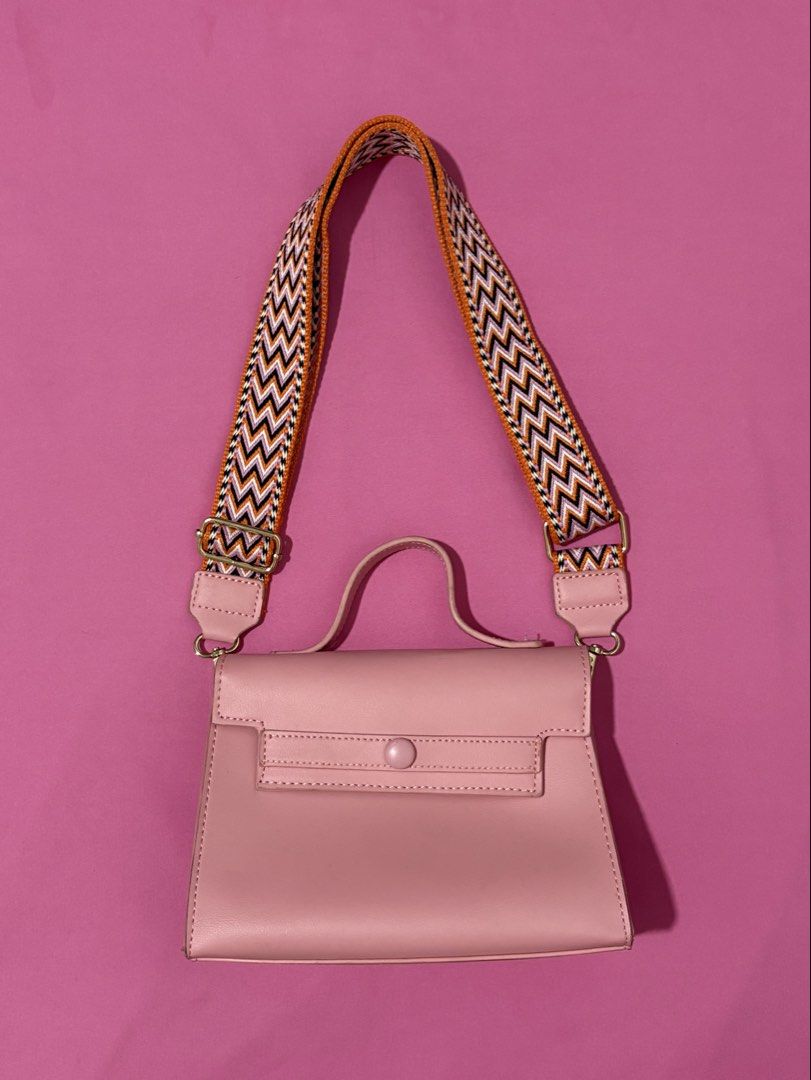 Cute Pink Handbag with Colorful Strap (Category: Shoulder Bags) located in Quezon City. Submitted by luna_ily (Listing ID 1463513079, Image 1). Description: 🍒 Be reminded that this is preloved and may not be in its best condition as before. It has very minimal stains but the zipper and the strap are still working properly. 🍒 Don’t hesitate to send a message for further details and inquiries. .