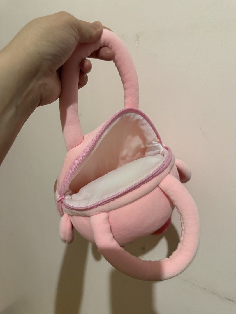 Cute Pink Kirby Plush Handbag (Category: Handmade Craft) located in Taytay. Submitted by cloudy_20 (Listing ID 1463478020, Image 3). Description: - Adorable pink plush handbag shaped like Kirby. - Secure zipper closure to keep your belongings safe. - Soft and comfortable handles for easy carrying. - Ideal for small essentials like your phone, wallet, or keys. - A must-have accessory for any Kirby enthusiast!.
