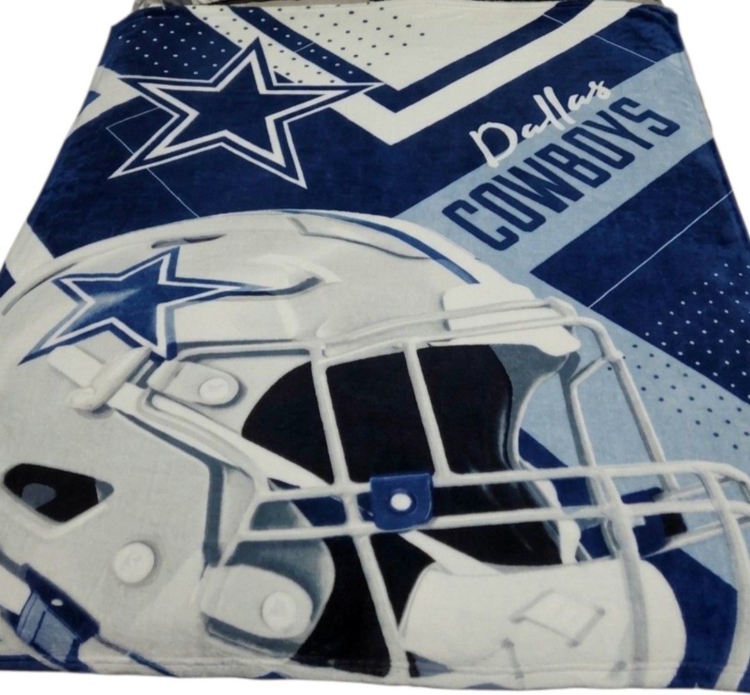 Dallas Cowboys Throw Blanket (Category: Bedding & Towels) located in Quezon City. Submitted by kirstenbella (Listing ID 1463341226, Image 1). Description: - Decorative team logo Dallas Cowboys Design - Super soft, fluffy and cozy - Made from 100% polyester raschel fabric - Uniquely plush, super-soft feel - 60" W x 80" L, offering expansive coverage large enough to top a bed - Like new condition .