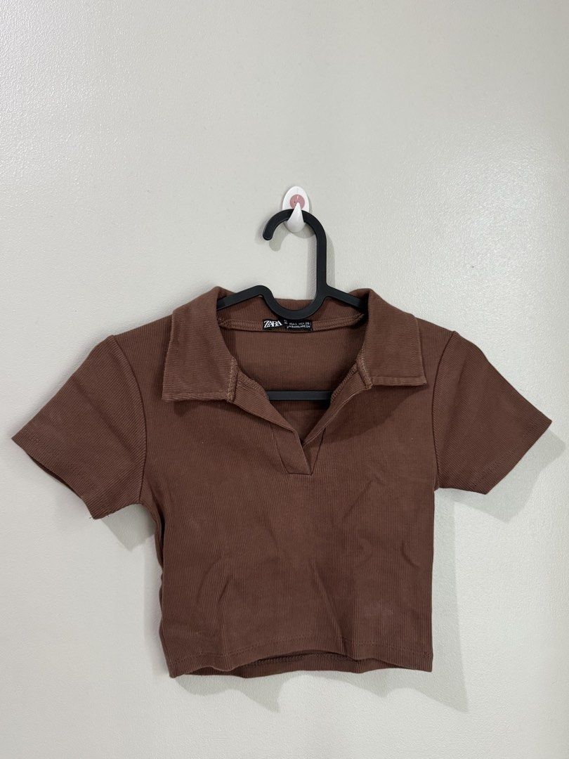 Dark Brown Cropped Polo (Category: Blouses) located in Manila. Submitted by icedcaramelmacchiiato (Listing ID 1463402242, Image 1). Description: Dark Brown Cropped Polo size s.