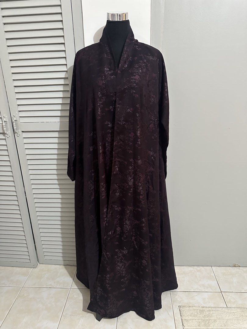 Dark Purple Abaya with Floral Pattern and Scarf (Category: Traditional & Ethnic wear) located in Subic. Submitted by ruffa_assorted_item (Listing ID 1463368574, Image 1). Description: - Perfect to size Xl - Xxl - Elegant dark purple abaya - Features a subtle floral pattern - Long sleeves and a flowing silhouette - Comes with a matching scarf - Versatile for formal occasions or everyday wear - Easy to style.