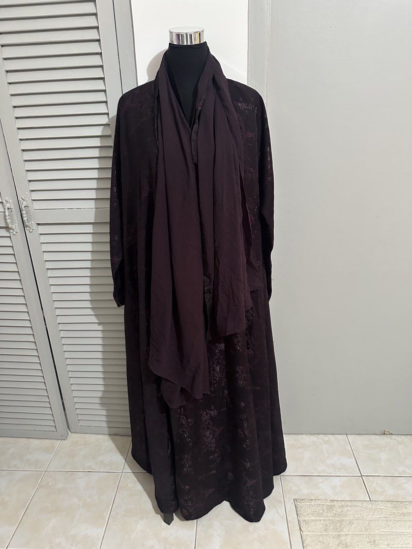 Dark Purple Abaya with Floral Pattern and Scarf (Category: Traditional & Ethnic wear) located in Subic. Submitted by ruffa_assorted_item (Listing ID 1463368574, Image 2). Description: - Perfect to size Xl - Xxl - Elegant dark purple abaya - Features a subtle floral pattern - Long sleeves and a flowing silhouette - Comes with a matching scarf - Versatile for formal occasions or everyday wear - Easy to style.