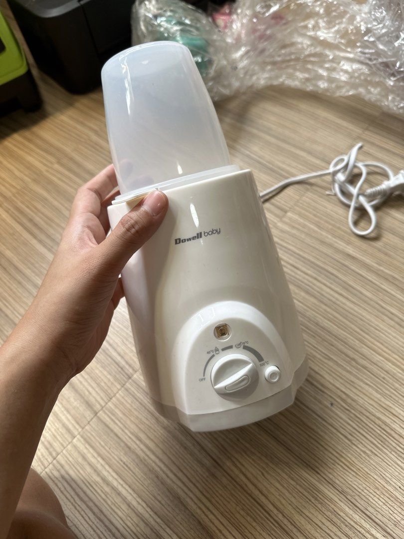 Dawell Baby Bottle Warmer (Category: Breastfeeding & Bottle Feeding) located in Valenzuela. Submitted by shopwithmika (Listing ID 1463364988, Image 1). Description: - Dawell Baby Bottle Warmer - Adjustable temperature settings from off to 100°C - Perfect for warming milk or baby food - Easy-to-use dial control - Comes with power cord.