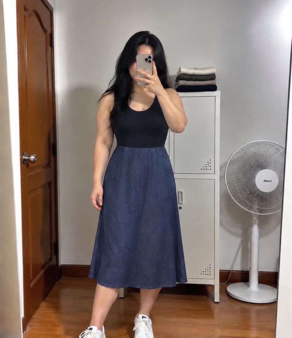 Denim Button-Front Midi Dress (Category: Dresses) located in Manila. Submitted by despacito17 (Listing ID 1463343116, Image 2). Description: - White top paired with a blue denim midi skirt - Skirt features a full button-front closure - Comfortable elasticated waistband - Midi length for a stylish silhouette - Effortlessly transitions from casual daywear to beach-ready chic.