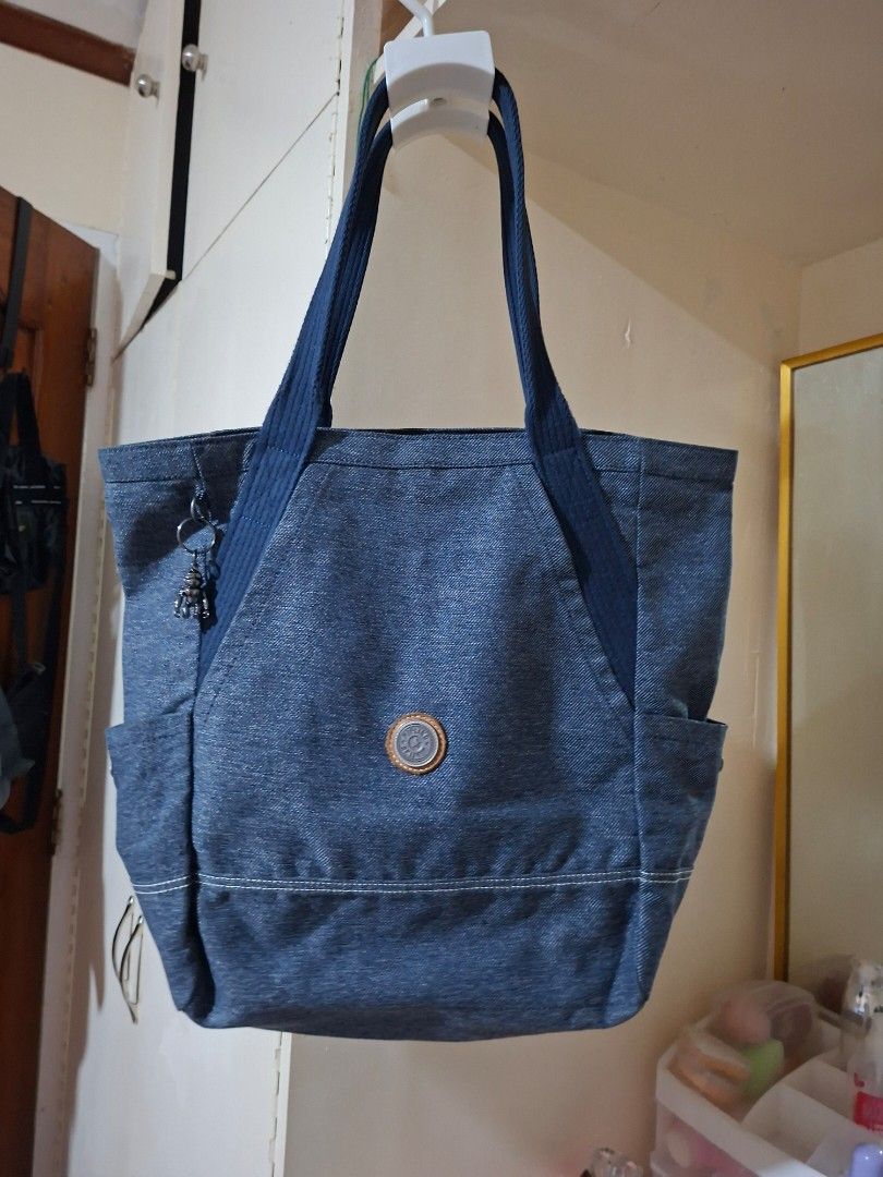 Denim Tote Bag with Zipper Closure (Category: Tote Bags) located in Cainta. Submitted by adie22 (Listing ID 1463343545, Image 1). Description: - Casual and durable denim tote bag - Zippered main compartment for secure storage - Sturdy straps for comfortable carrying - Ideal for everyday use, shopping trips, or as a travel companion - Simple and practical design.