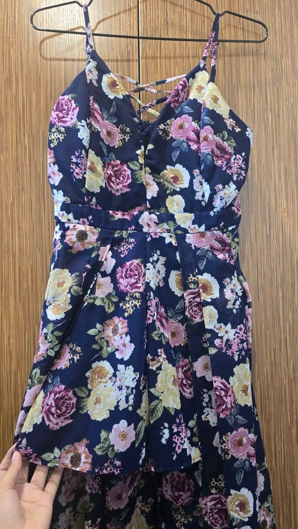 Derek Heart Maxi Dress (Category: Dresses) located in Cebu City. Submitted by kitty_12345_ (Listing ID 1463383723, Image 3). Description: Derek Heart brand new dress - from US - still with tag - price is negotiable pero wag naman super barat since its brandnew pa - Size: Medium - Navy blue maxi dress (short sa front and long sa back) - Beautiful floral print - Criss-cross back detail - Lightweight and flowy fabric - Perfect for summer days or cas