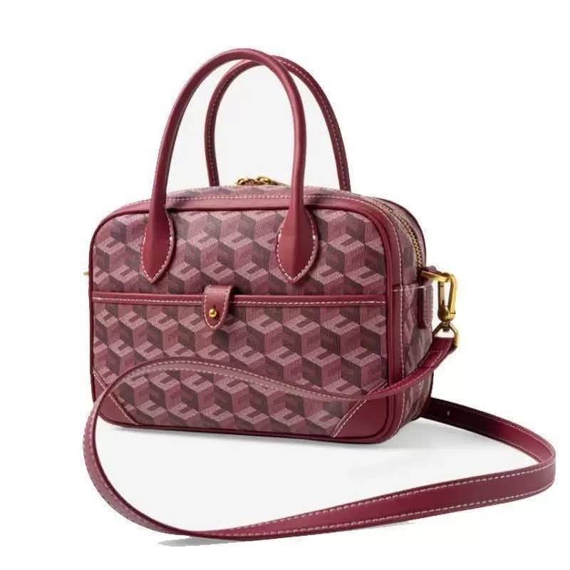 Designer Monogram Canvas Top Handle Bag (Category: Shoulder Bags) located in Manila. Submitted by onlineshopmate (Listing ID 1463357315, Image 1). Description: - Stylish top handle bag with classic monogram print. - Secure snap closure for safety. - Detachable shoulder strap for versatile carrying options. - Spacious interior for all your daily essentials. - Available in multiple attractive colors. - Ideal for both work and casual weekend outings