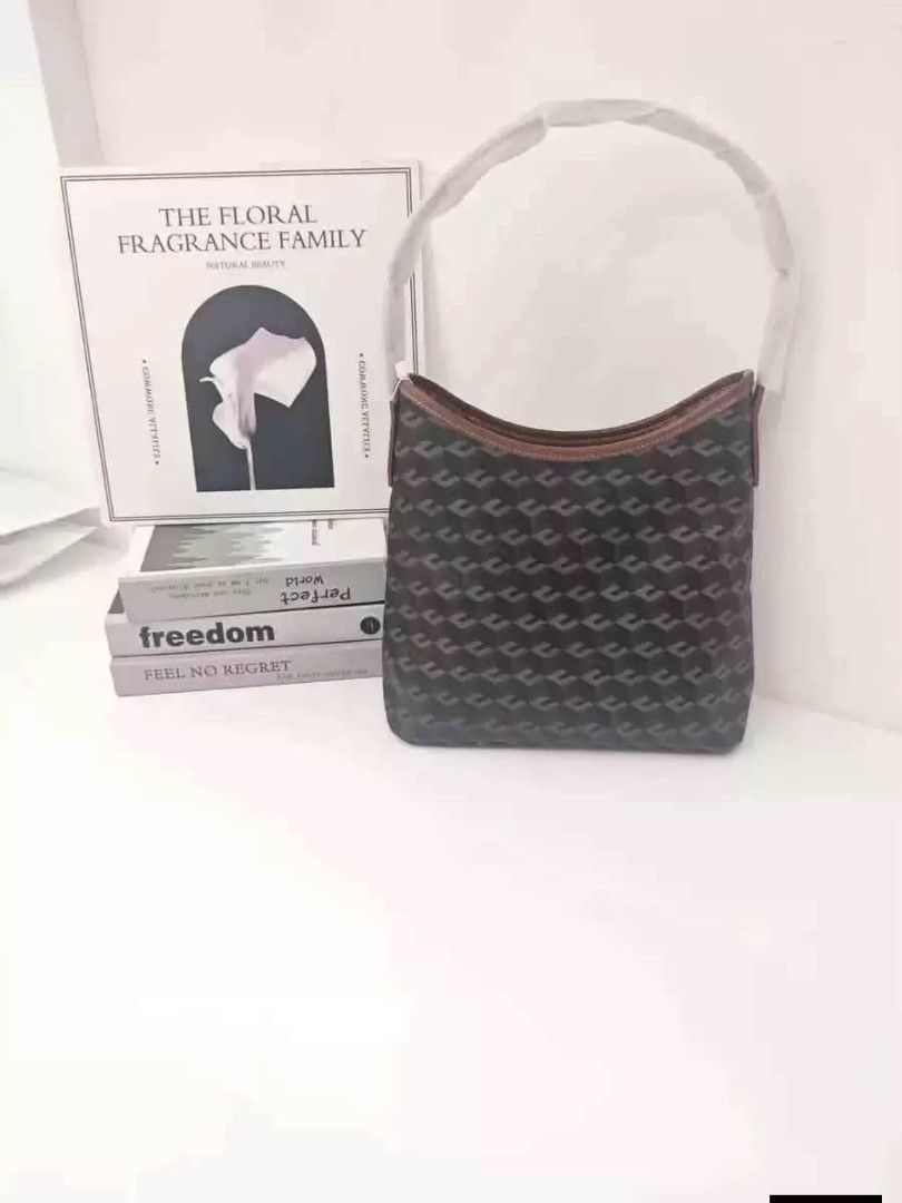 Designer Monogram Shoulder Bag (Category: Shoulder Bags) located in Manila. Submitted by onlineshopmate (Listing ID 1463357962, Image 3). Description: - Cute shoulder bag with classic monogram pattern - Light-colored strap - Ideal size for everyday essentials - Spacious interior - Perfect for casual outings, stylish and practical.
