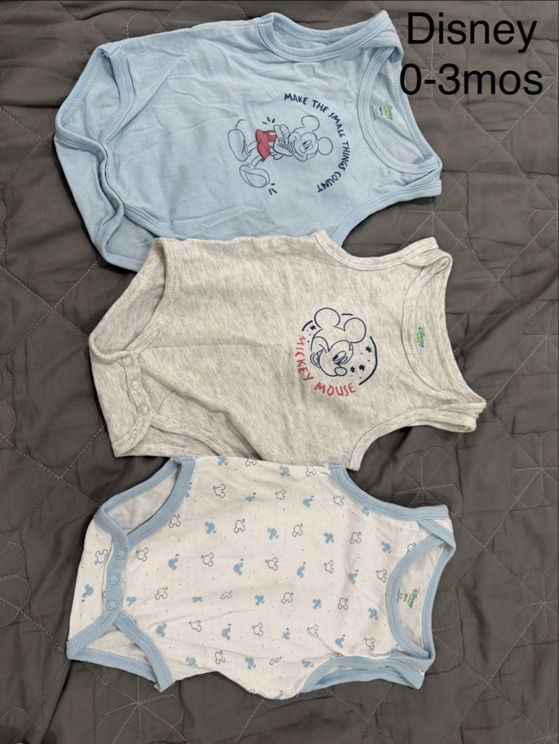 Disney & More Baby Bodysuits 0-3 Months (Category: Babies & Kids Fashion) located in Manila. Submitted by kristielyntan (Listing ID 1463395207, Image 1). Description: - Bundle of 12 baby bodysuits - Size: 0-3 months - Assorted prints: Disney Mickey Mouse, fruits, vegetables, plaid - Sleeve types: Mix of short-sleeved and long-sleeved - Ideal for everyday wear - All items are clean and ready for a new home.