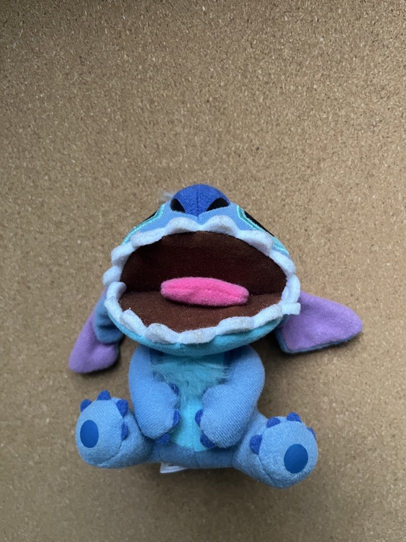 Disney Stitch Plush Toy (Category: Plushies & Soft Toys) located in Baguio. Submitted by gaara1234 (Listing ID 1463391491, Image 1). Description: - Adorable Stitch plush toy - Features a big mouth open with tongue out - Soft and cuddly material - Ideal for Disney fans - Great for display or play.