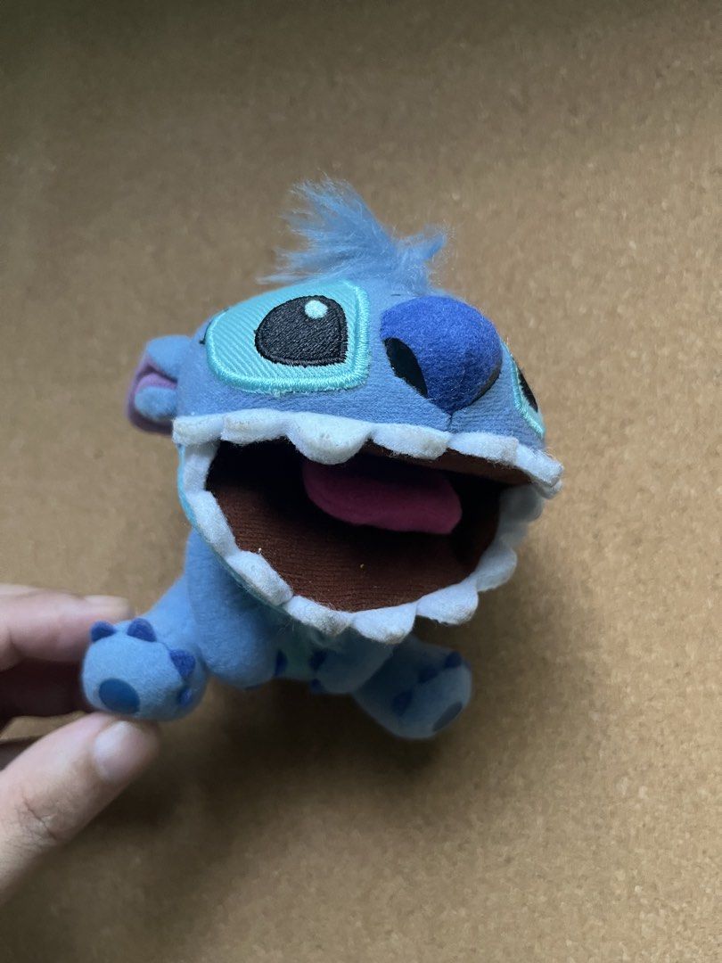Disney Stitch Plush Toy (Category: Plushies & Soft Toys) located in Baguio. Submitted by gaara1234 (Listing ID 1463391491, Image 2). Description: - Adorable Stitch plush toy - Features a big mouth open with tongue out - Soft and cuddly material - Ideal for Disney fans - Great for display or play.