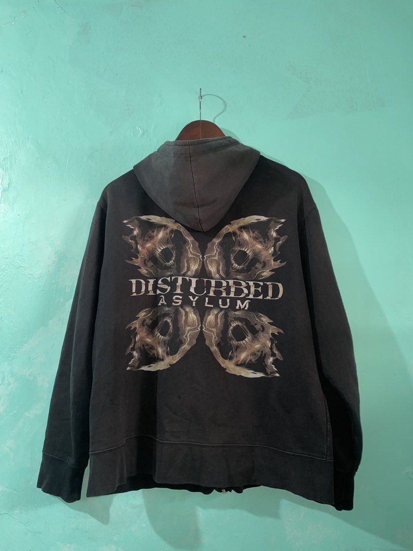 Disturbed Asylum Zip-Up Hoodie (Category: Hoodies) located in Manila. Submitted by joshua_guimeroy. (Listing ID 1463549849, Image 2). Description: - Black zip-up hoodie from Disturbed - Features 'Asylum' album graphic on the back - Distressed design on the front - Made by Bravado - Great for any fan of the band - Shows some signs of wear but still has plenty of life left.