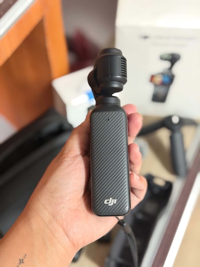 DJI Osmo Pocket 3 Creator Combo Gimbal Camera (Category: Cameras) located in Lipa City. Submitted by chriznabua94316 (Listing ID 1463494375, Image 2). Description: - DJI Osmo Pocket 3 Creator Combo for sale. - Compact gimbal camera ideal for vlogging. - Captures incredibly smooth footage. - Includes: Osmo Pocket 3 camera, protective case, mini tripod, and wireless microphone transmitter. - Everything you need to start creating content. - Feel fre
