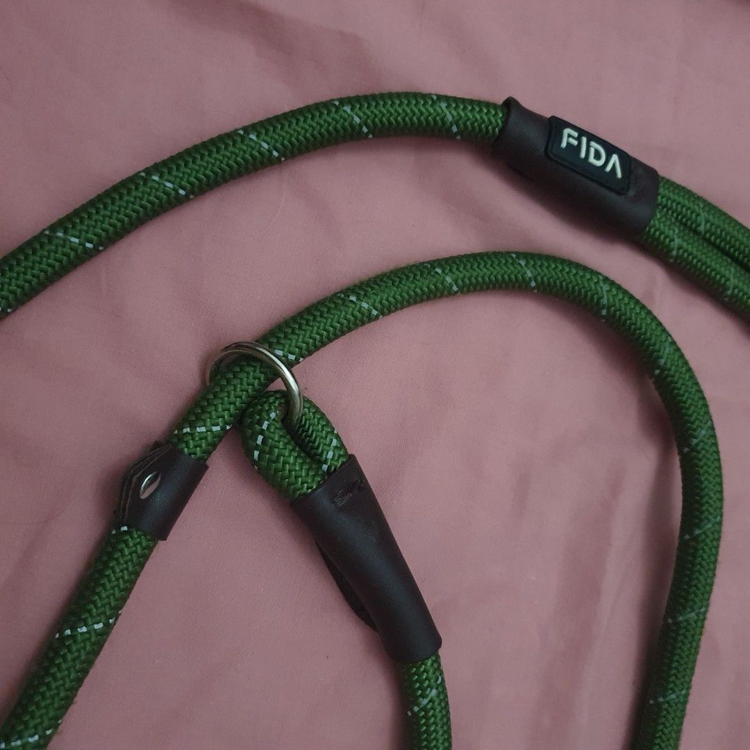 Dog Harness and Leash Set (Category: Homes & Other Pet Accessories) located in Paranaque City. Submitted by cobien (Listing ID 1463474078, Image 3). Description: - Grey mesh dog harness with reflective trim - Dark blue patterned leash included - Green FIDA rope leash with comfortable handle - Rope leash is adjustable and can be used as a slip lead - Great for walks and training.