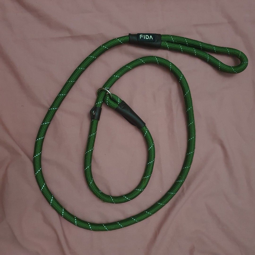 Dog Harness and Leash Set (Category: Homes & Other Pet Accessories) located in Paranaque City. Submitted by cobien (Listing ID 1463474078, Image 2). Description: - Grey mesh dog harness with reflective trim - Dark blue patterned leash included - Green FIDA rope leash with comfortable handle - Rope leash is adjustable and can be used as a slip lead - Great for walks and training.