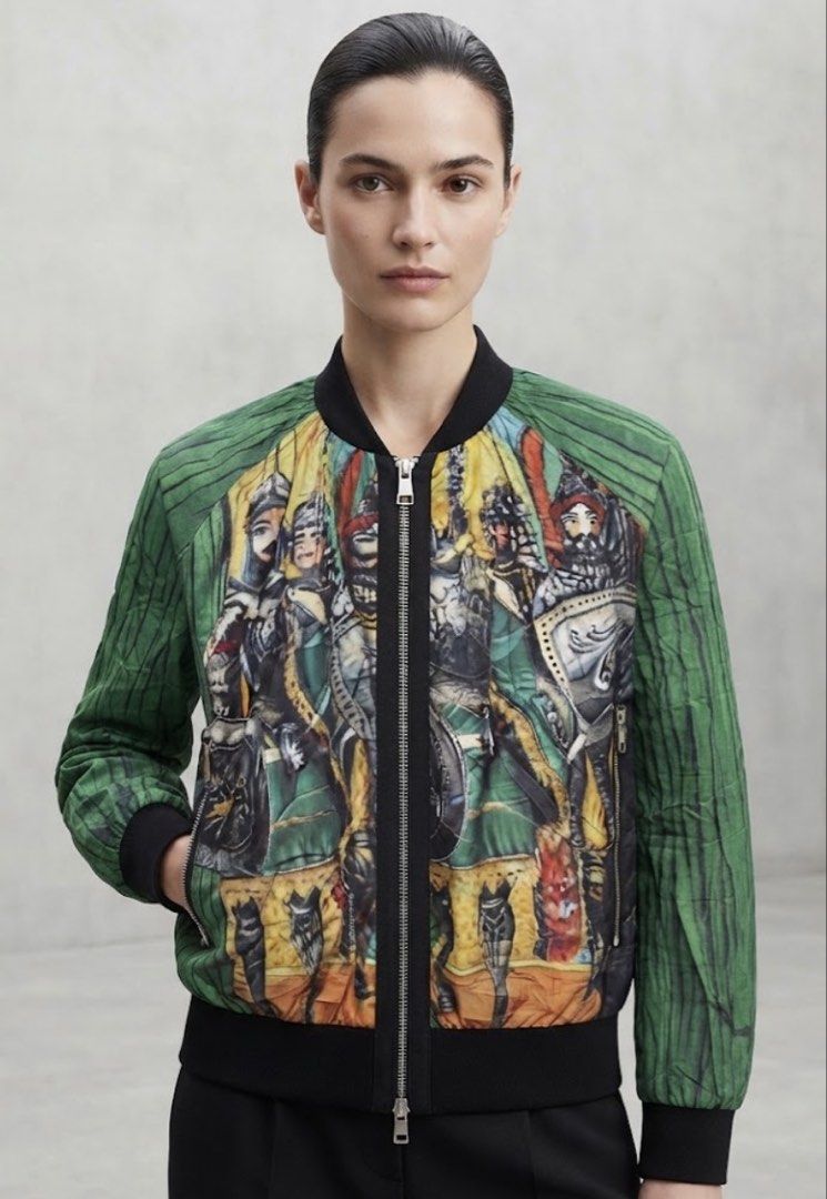 Dolce & Gabbana Knight Print lightweight Bomber Jacket (Category: Longsleeves) located in Donsol. Submitted by saksthriftavenuebyluckymaria8 (Listing ID 1463454013, Image 2). Description: - Stylish green bomber jacket - Features a bold knight print - Full zip closure - Ribbed cuffs and hem for a comfortable fit - Made in Italy - High-quality Lampo zipper hardware - Dolce & Gabbana zipper pull Dolce & Gabbana bomber jacket featuring a distinctive 