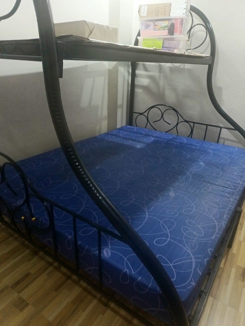 Double Deck Frame with Mattresses (Category: Bed Frames & Mattresses) located in Manila. Submitted by rare.godffrey612 (Listing ID 1463496371, Image 2). Description: FOR SALE! Double Deck Bed with Mattresses Below: Queen Size Mattres Top: Single Size Mattress Pwede sa maselan pwede sa maarte Open for Negotiations Rfs: Too big for our new home. Loc: Quezon City.
