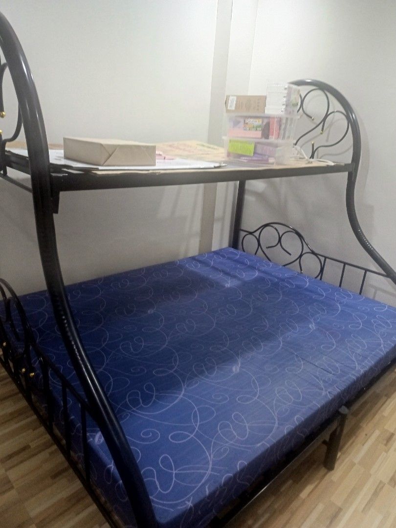 Double Deck Frame with Mattresses (Category: Bed Frames & Mattresses) located in Manila. Submitted by rare.godffrey612 (Listing ID 1463496371, Image 3). Description: FOR SALE! Double Deck Bed with Mattresses Below: Queen Size Mattres Top: Single Size Mattress Pwede sa maselan pwede sa maarte Open for Negotiations Rfs: Too big for our new home. Loc: Quezon City.