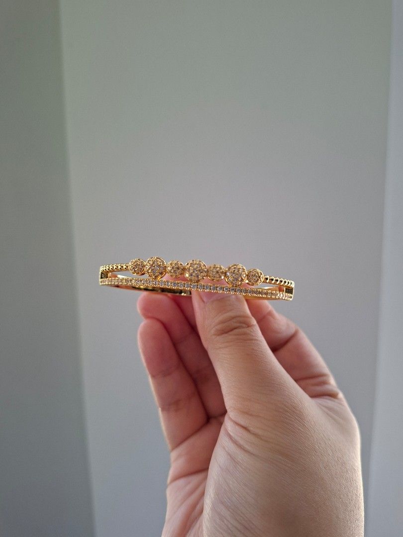 Double Layer Bubbles Gold Zirconia Stones Bangle Bracelet (Category: Bracelets) located in Dasmarinas. Submitted by danabrie22 (Listing ID 1463447897, Image 3). Description: brand new - stainless steel - cubic zirconia stones 10/10 condition from Hongkong.