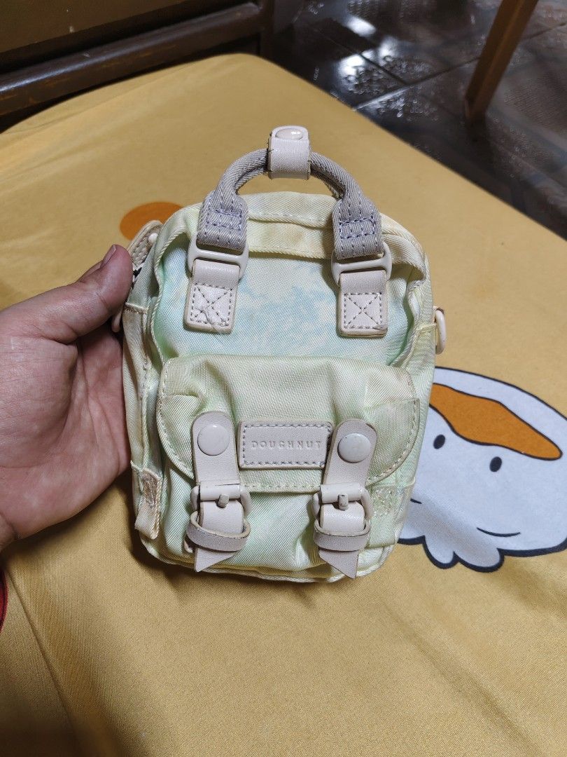 Doughnut Mini Backpack Purse Pastel Tie-Dye (Category: Backpacks) located in General Mariano Alvarez. Submitted by findsandmoreph (Listing ID 1463412444, Image 2). Description: OG DOUGHNUT MINI SLING ISSUE INDICATED SA PICTURE.