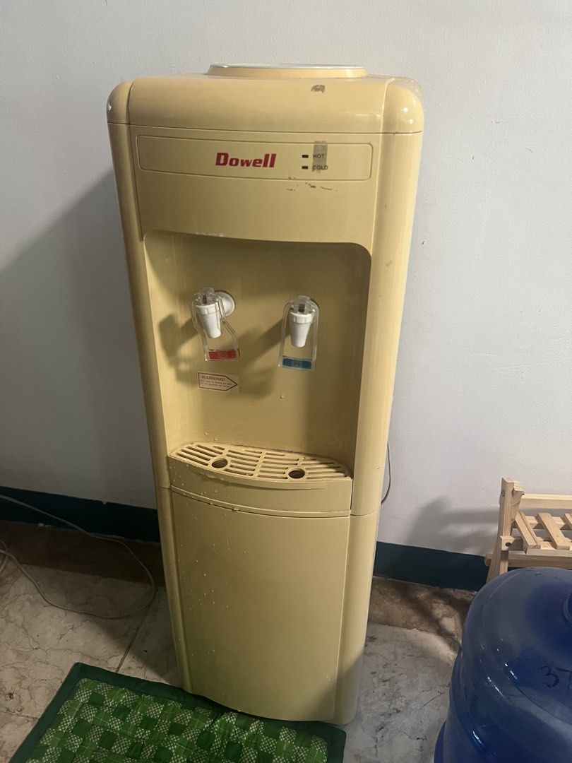 DOWELL Water Dispenser Hot/Cold with Compartment (Category: Water Purifiers & Dispensers) located in Mandaluyong City. Submitted by coracloset (Listing ID 1463523223, Image 1). Description: - Dowell brand - topload, working with hot and cold function - has separate on/off switch buttons at the back to save electricity - as is where is - what you see is what you get - this is old and used hence the discounted price, kindly manage expectations - yo