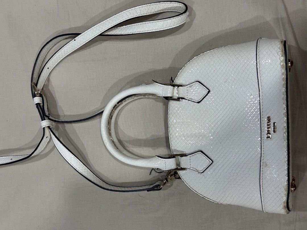 Dune Dome Handbag with Strap (Category: Luxury Bags & Wallets) located in Manila. Submitted by zhurimm (Listing ID 1463528436, Image 2). Description: Pangharabas Can give this for free when you buy anything from my listings worth 200 Inclusion: dust bag and paper bag.