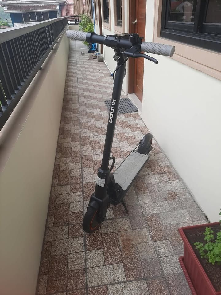 Electric Kick Scooter (Category: Skates, Rollerblades & Scooters) located in Tanza. Submitted by joviemanlangit (Listing ID 1463379156, Image 2). Description: OPEN FOR NEGOTIATION WE ACCEPT CREDIT CARD PAYMENT. - KUGOO electric scooter in black with grey grips and deck. - Digital display shows speed and battery level. - Folds for convenient storage and transport. - Ideal for fast and easy commutes or recreational rides around town..