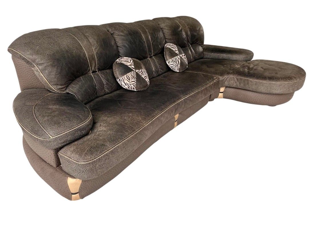 ELEGANT BIG L-TYPE GERMAN LEATHER SOFA (Category: Sofas) located in Mexico. Submitted by mgracejapansurplus (Listing ID 1463410725, Image 3). Description: NEW ARRIVAL 🔥 JAPAN SURPLUS 🇯🇵 ELEGANT BIG L-TYPE GERMAN LEATHER SOFA ✔️Luxurious dark brown textured full leather ✔️ Classic curved design with right-side rounded chaise ✔️ decorative round throw pillows with zebra-pattern accents ✔️Stitched detailing & light wood trim — premium elegant sty