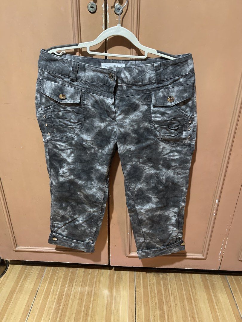 Eltoo Tie-Dye Capri Pants Size L (Category: Other Bottoms) located in Quezon City. Submitted by donnabelle7572 (Listing ID 1463458342, Image 1). Description: - Brand: Eltoo - Style: Tie-Dye Capri Pants - Color: Grey - Size: L - Closure: Button and zip fly - Pockets: Two front pockets with button and stud details - Hem: Cuffed with button detail - Origin: Made in Korea.